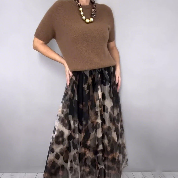 Two Piece Women's Set Consisting Of a Sweater and a Flowy Leopard Print Skirt