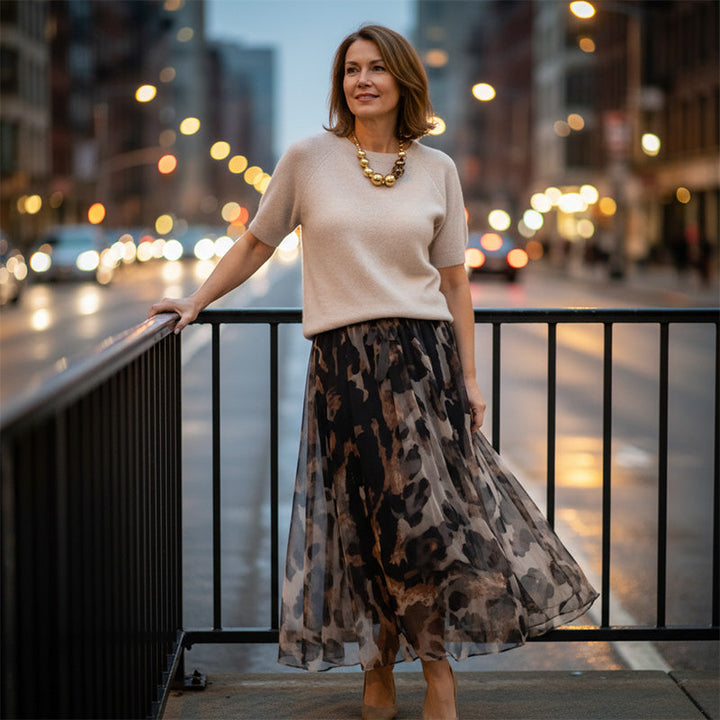 Two Piece Women's Set Consisting Of a Sweater and a Flowy Leopard Print Skirt