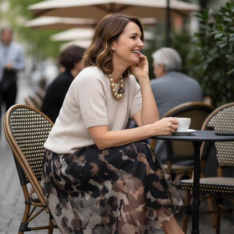 Two Piece Women's Set Consisting Of a Sweater and a Flowy Leopard Print Skirt